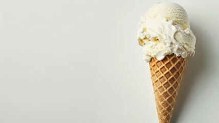 Vanilla ice cream in cone on white background