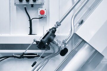 Hydraulic mechanical drive on an industrial machine, industrial concept background.