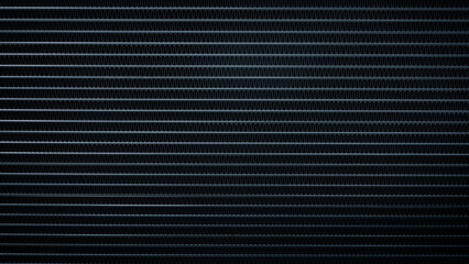 A black and white backgroundof a metal surface with a lot of lines
