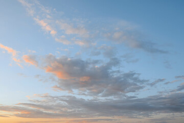 Sunset sky in the morning with sunrise and soft pink clouds with yellow tones, happy,day, back ground