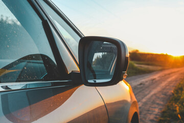 Reflected road in rearview mirror, tourism concept