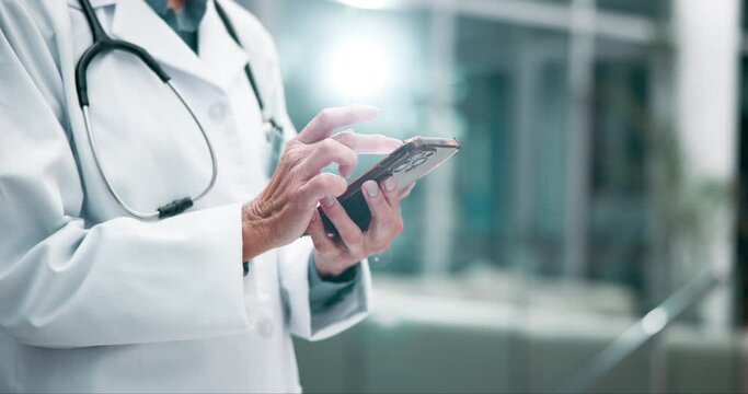 Doctor, phone and scroll in hospital for research, communication or healthcare development news. Woman, smartphone and typing in clinic for electronic medical record, telehealth and mobile health app