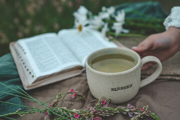 Cup of BLESSED in hands, good morning, Christian concept