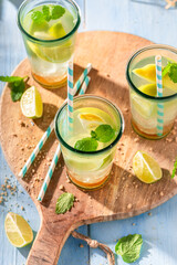 Homemade lemonade with crushed ice and sour fruit.