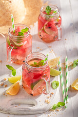 Homemade and fresh lemonade with mint, sugar and ice.