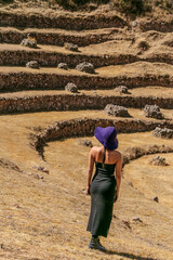 Woman model posing in the ruins of Moray Cusco