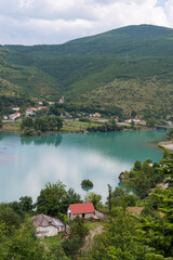 Fototapeta premium Village near lake Komoni in the countryside of North Albania