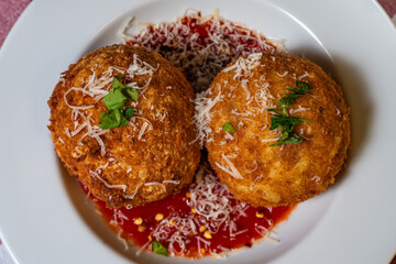 Top View of Crispy Arancini with Marinara Sauce