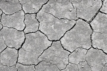 Wall texture soil dry crack pattern of drought lack of water of nature brown old broken background.