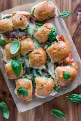 Above view of homemade pull apart Italian sub slider buns, ready for eating.