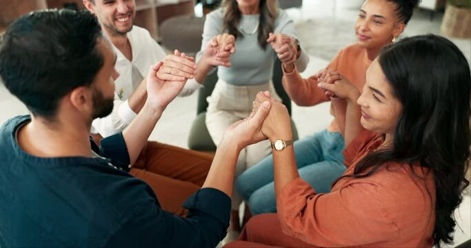 Holding hands, therapy and circle with business people, conversation and question for counseling. Smile, employee and group discussion with support and empathy with teamwork and kindness at job
