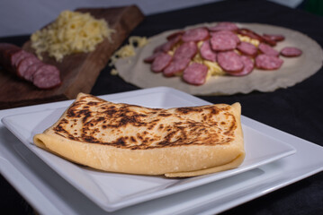 delicious French crepe with cheese and Calabrian sausage