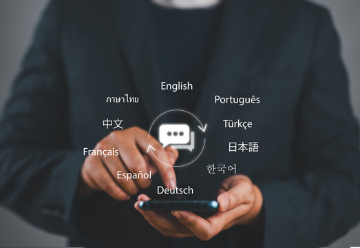 Translator app, language course and e-learning concept. Person use smartphone with Translator app, translation or translate on the mobile app worldwide language conversation speaking concept.