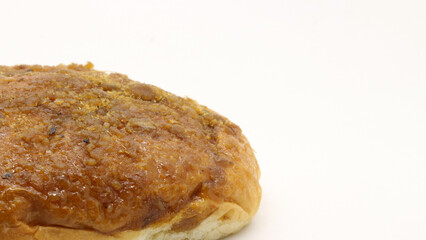 Delicious bread with shredded topping isolated