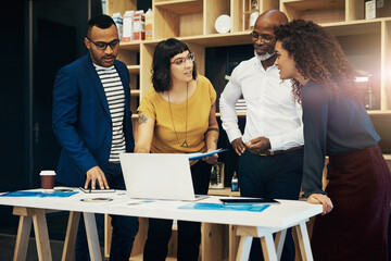Team, meeting and digital collaboration with laptop, web design and business people with discussion. Startup, management and professional planning for website update at creative company with tech