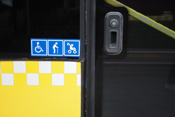 Enhancing accessibility with yellow checkerboard symbols for public transportation icon display