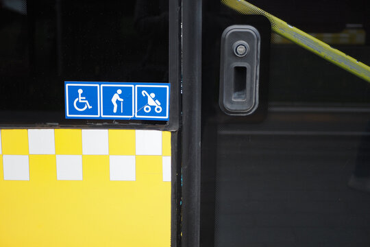 Enhancing accessibility with yellow checkerboard symbols for public transportation icon display