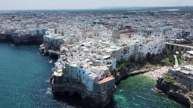 Aerial 4K footage of the seaside town of Polignano a Mare in the Apulia region of southern Italy