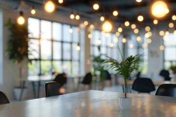 Beautiful blurred background of a light modern office interior with panoramic windows and beautiful lighting.