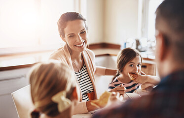 Woman, smile and children eating breakfast in kitchen for bonding, love and care with healthy food or cereal. Mom, girl and family with support wellness and together in house for youth development