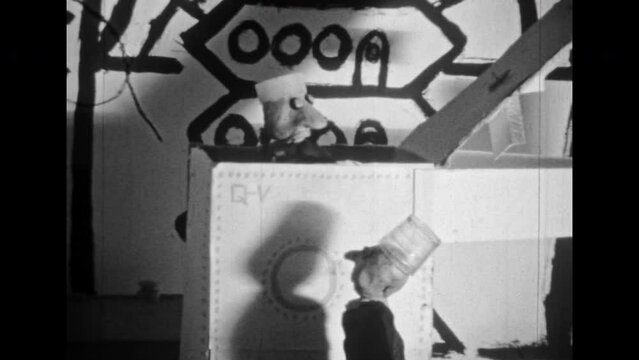 Film archive, funny plasticine men stop motion animation. Weird little aliens friends, retro puppet cartoons. Creative animated artwork. Surreal friendship. Vintage black white movie. Retro 1980s