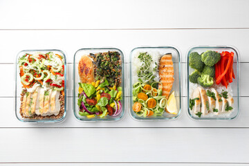 Healthy meal. Containers with different products on white wooden table, flat lay