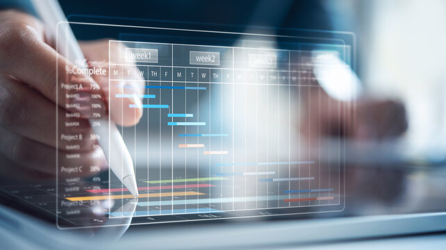 Project management. Project manager updating tasks, milestone progress planning with augmented reality Gantt chart scheduling and calendar planner on virtual screen. Business tasks evaluation