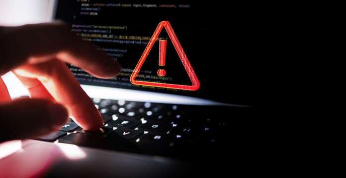System hacked warning alert on laptop. Cyber attack on computer network, Virus, Spyware, Malware or Malicious software. Cyber security and cybercrime. alarm caution warning notification