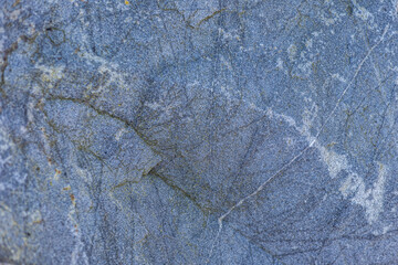 An abstract natural stone background. A banner made of stone. A place to demonstrate the product.