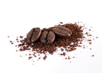 Pile of ground coffee and coffee beans isolated on white background