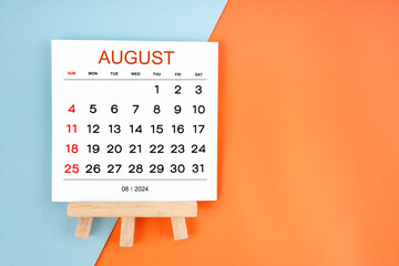 2024 August calendar page on blue and orange background.