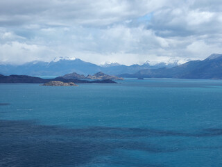 General Carrera Lake (Chilean part) or Lake Buenos Aires (Argentine part) is located in Patagonia and shared by Argentina and Chile. It is of glacial origin and is surrounded by the  Andes mountains. 