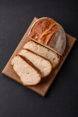 A loaf of brown bread with grains of cereals