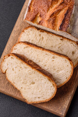 A loaf of brown bread with grains of cereals