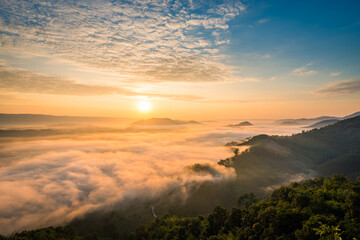 Sunrise and the mist in winter morning