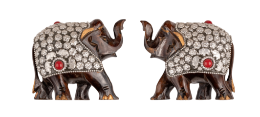 Figurine of a wooden elephant isolated on a white background, in Indian style