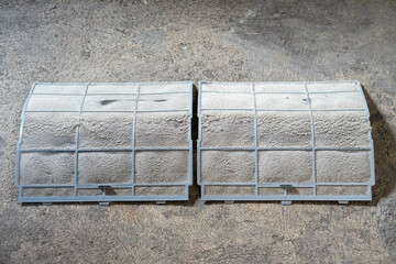 dust and dirty inside air conditioner filter on floor