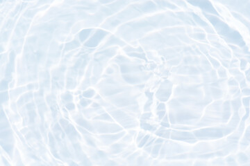 Obraz premium White water with ripples on the surface. Defocus blurred transparent white colored clear calm water surface texture with splashes and bubbles. Water waves with shining pattern texture background.
