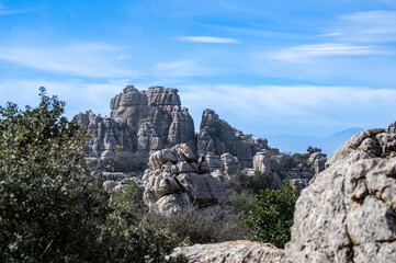 Hiking in the Torcal de Antequerra National Park, limestone rock formations and known for unusual karst landforms in Andalusia, Malaga, Spain.