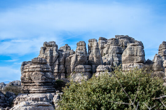 Hiking in the Torcal de Antequerra National Park, limestone rock formations and known for unusual karst landforms in Andalusia, Malaga, Spain.
