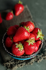 Freshly Picked Strawberries in Bowl on Green Napkin