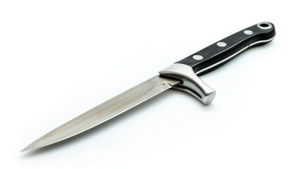 Fototapeta premium A close-up shot of a knife with a black handle placed on a white surface