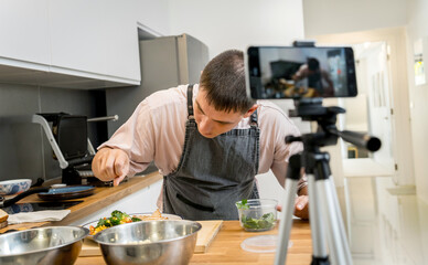 The chef is broadcasting live from workshop how to prepare a vegetarian food