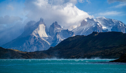 A view of the Cerro Paine Grande and Mont Almirante Nieto where heavy winds cause dramatic clouds...