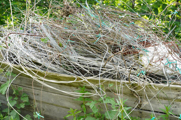 Garbage, cable, wire, rubble in a container