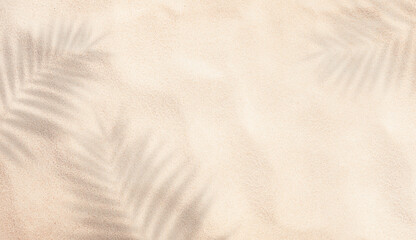 summer background of beach sand with shadows from palm leaves, top view © Ирина Гутыряк