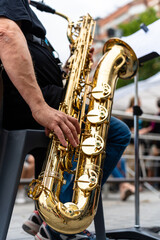 Brass musicians from a band with a saxophone