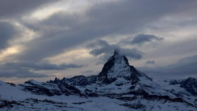 Matterhorn is a large, near-symmetric pyramidal peak in the extended Monte Rosa area of the Pennine Alps, whose summit is 4,478 metres (14,692 ft) above sea level.