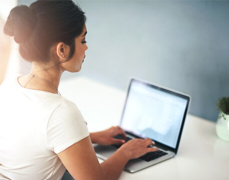 Typing, office and business woman on laptop for online project, research and working on proposal at desk. Virtual assistant, administration and person on computer for internet, website and planning