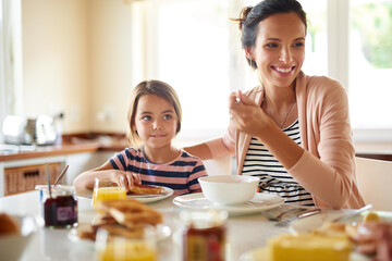 Smile, woman and child eating breakfast kitchen for bonding, love and care of healthy cereal for...